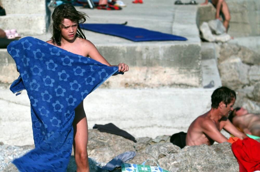 Nudist Rocky Family Angle - Nature and nudism are the best home for a person