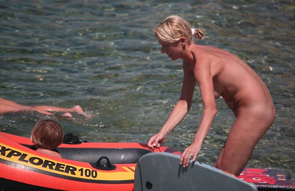 Red Boating for Two Nudists pics - Through naturism, people seek the opportunity to feel free and in harmony