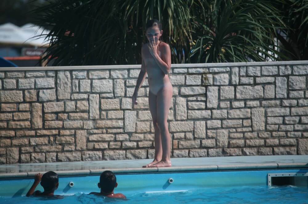 Naturist Pool-Side Singles photos - In naturism, people are equal regardless of circumstances