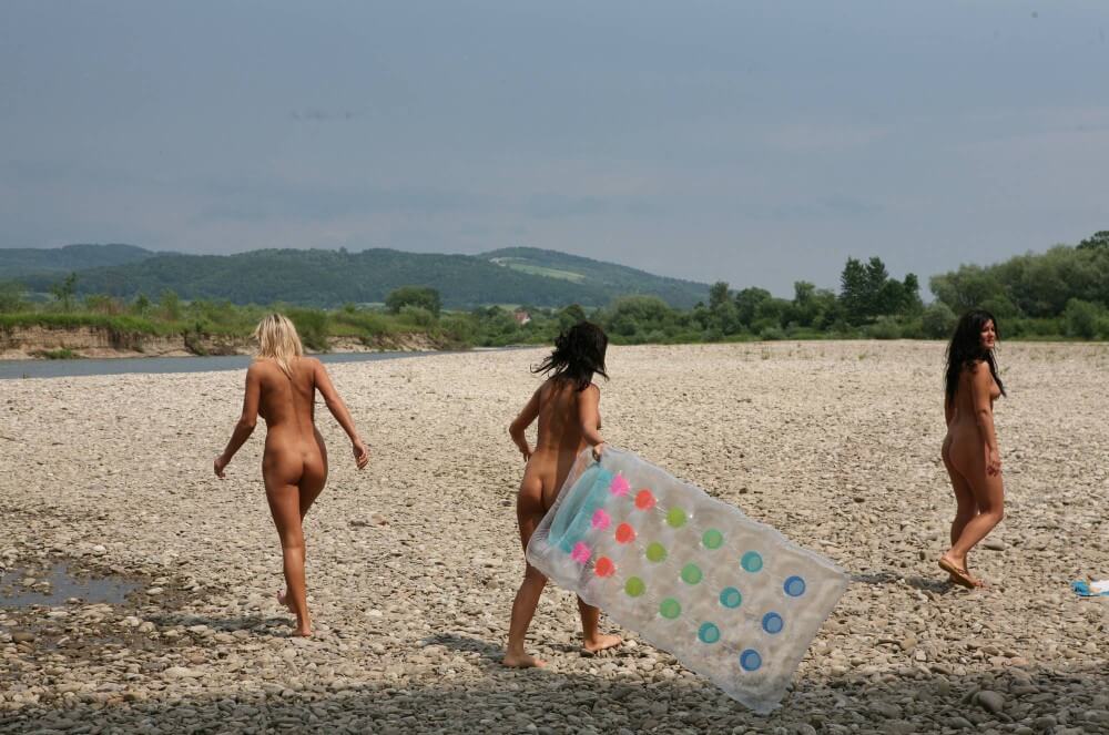 Naturist Park Floating On River photos - Living in harmony with nature as the primary goal of the naturist lifestyle
