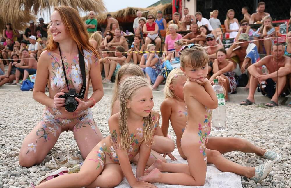 Warm Sand Relaxation photos - The practice of naturism helps build trust and honesty among people