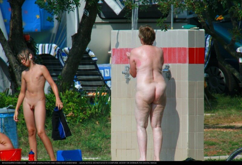 Covered in Towel Nudists-Boardwalk Biking - Naturism teaches respect for the natural world and for others