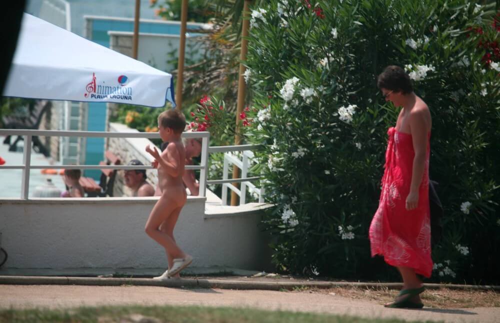 Naturist Pool Walkaround pics - Nudism fosters trust and mutual understanding