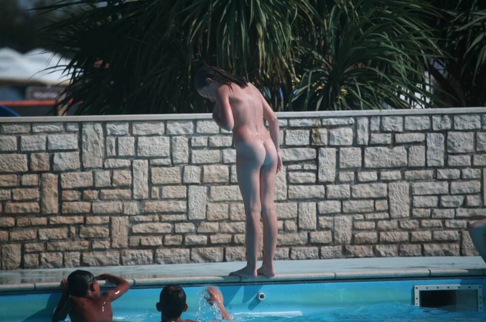Naturist Pool-Side Singles pics - Nudity is perceived as a natural expression of life