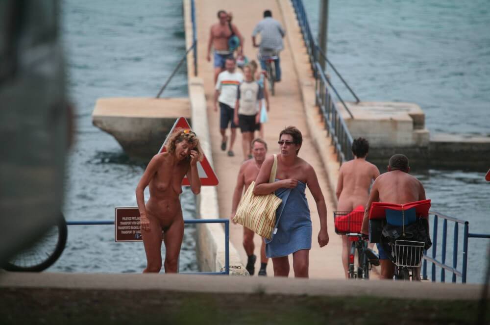 Crete FKK Bridge Crossing photos - People come together in unity with nature to take off their clothes